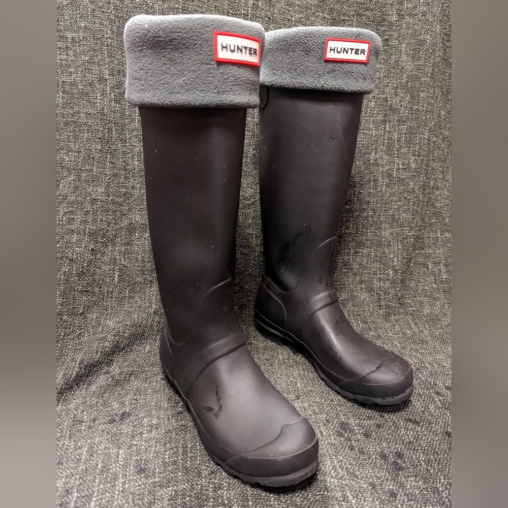 Black tall Hunter back adjustable rain boots with grey fleece inserts
